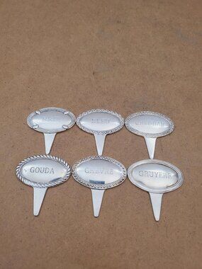 Pottery Barn silver cheese markers. Set of 6